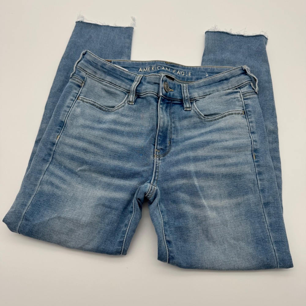 American Eagle Super Stretch‎ Jegging Light Wash Raw Hem Jeans Women Size 4